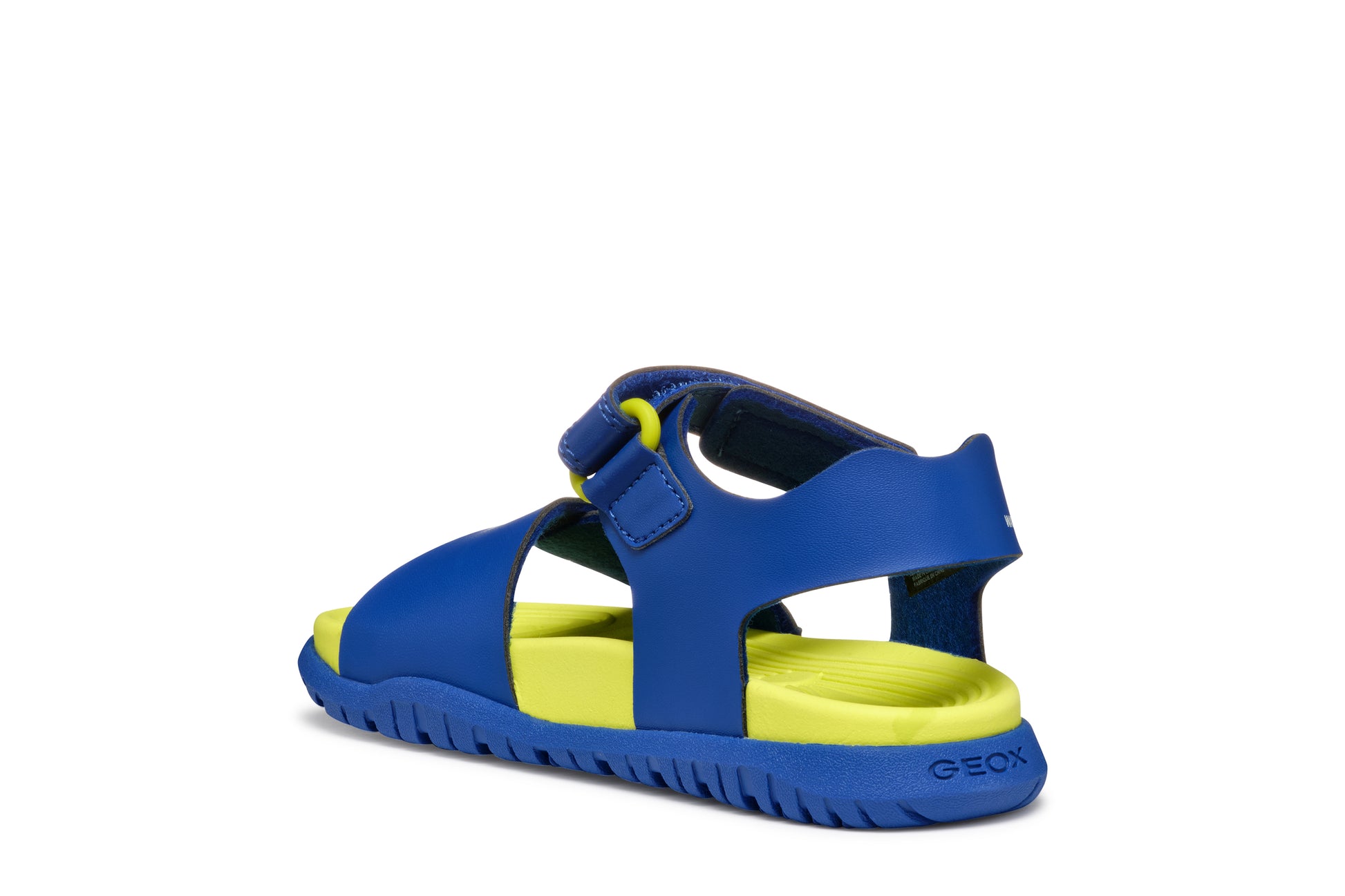 A boys sandal by Geox, style Fusbetto in royal blue and green with velcro strap and buckle at the front. Inner back view
