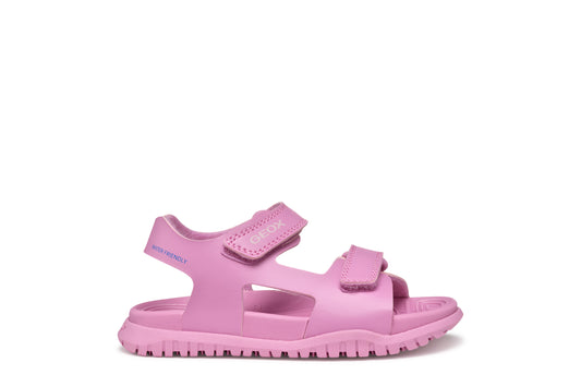 A open toe synthetic water friendly sandal by Geox. Style Fusbetto in pink with two velcro fastenings. Right side view.