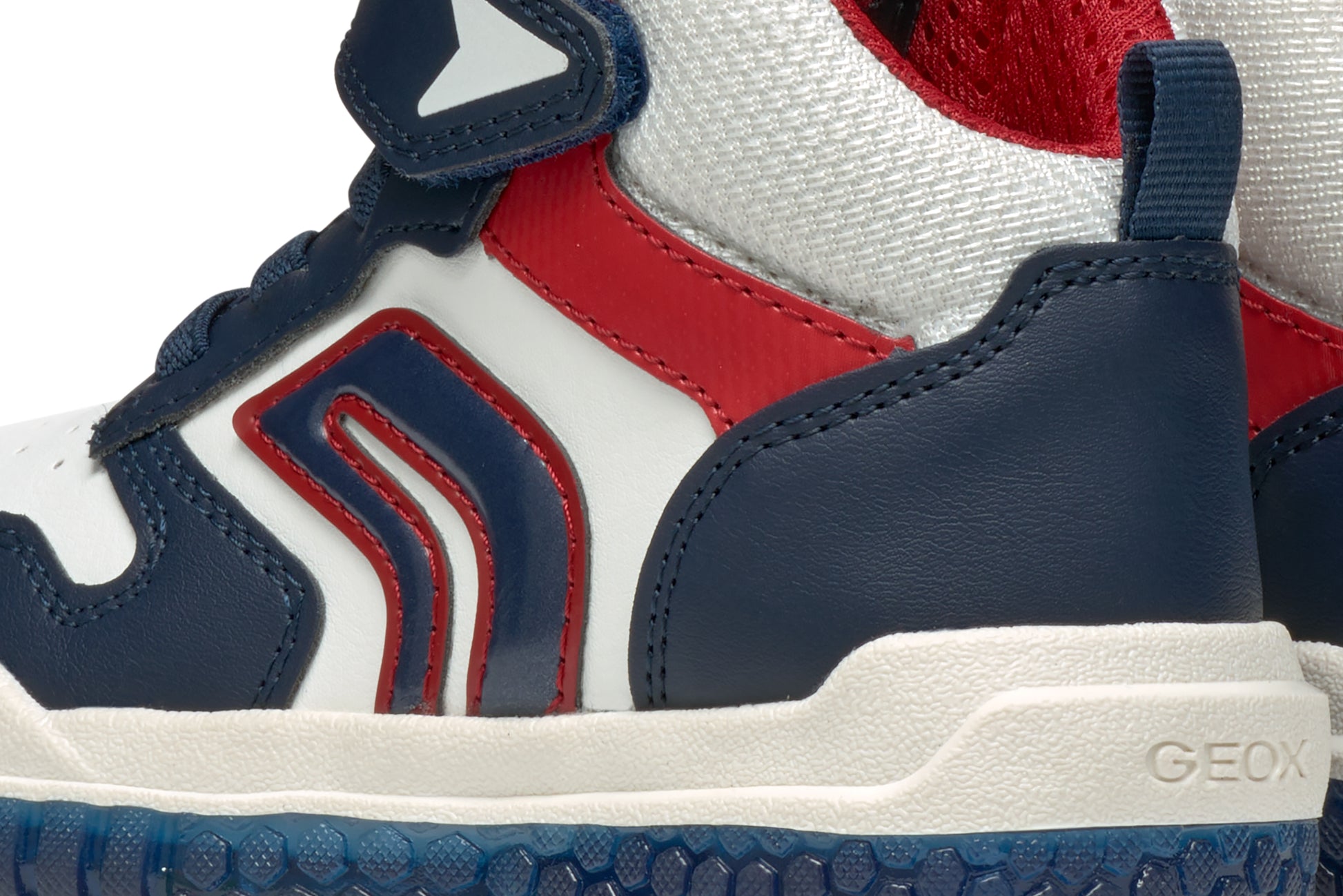 A boys high-top by Geox, style Buzzerlight, in navy, white and red, Velcro fastening. Close up view.