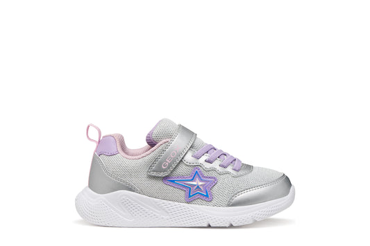 A girls trainer by Geox, style Sprintye in silver/lilac with velcro strap and elastic laces, star design on side, silver detail on heel and toe and white sole. Right side view