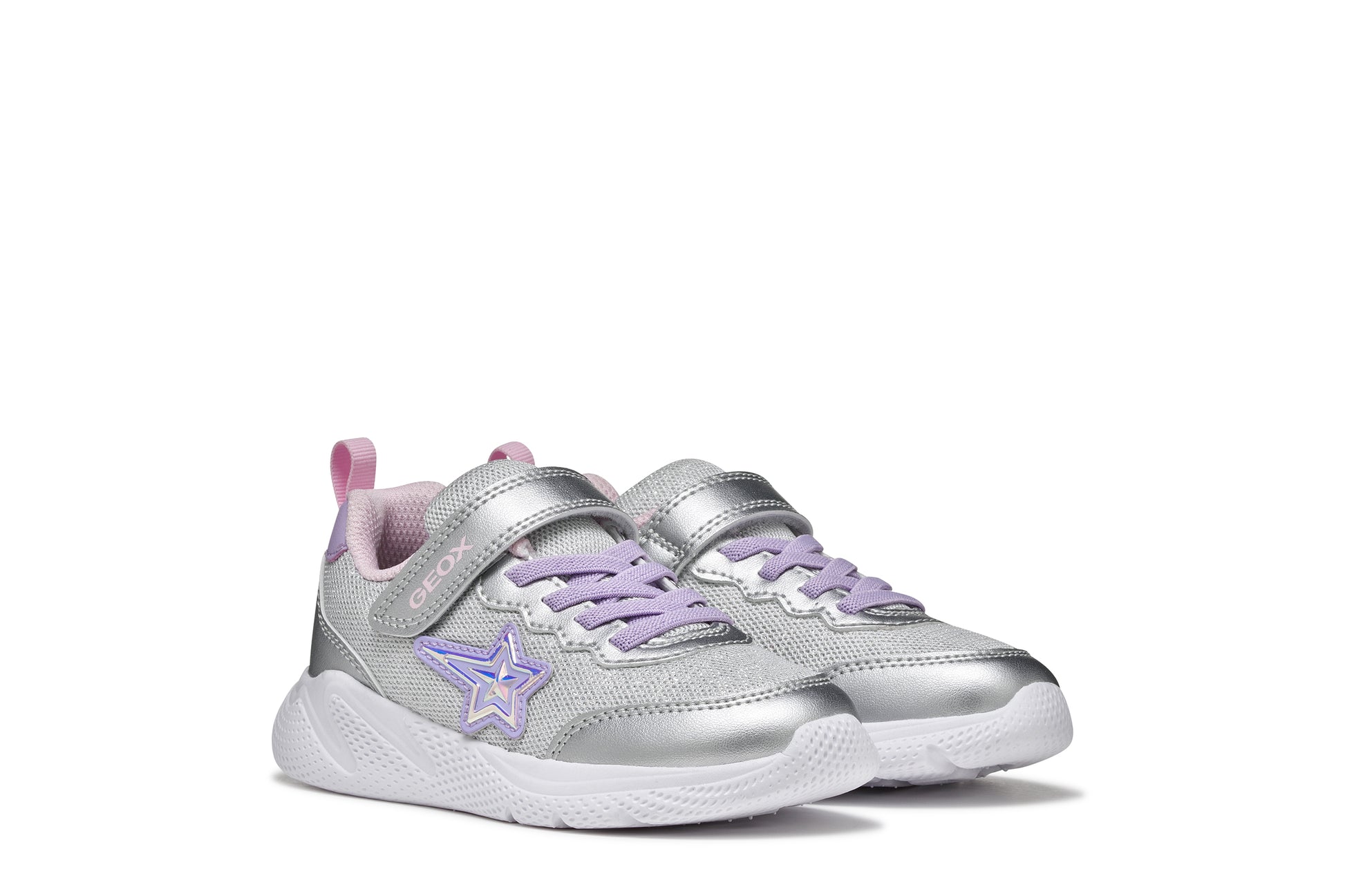 A girls trainer by Geox, style Sprintye in silver/lilac with velcro strap and elastic laces, star design on side, silver detail on heel and toe and white sole. View of front of pair side by side