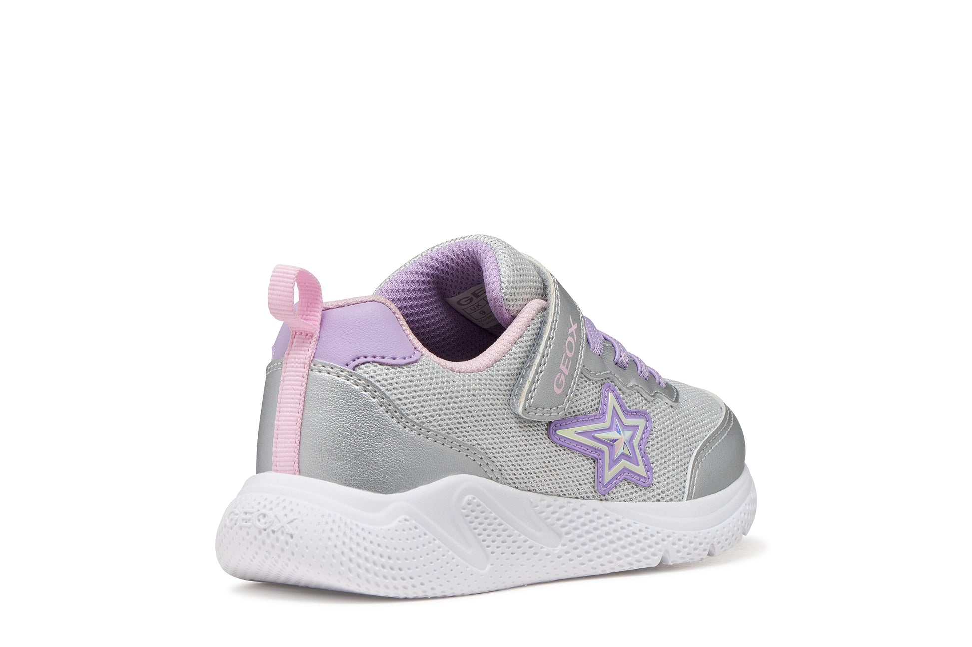 A girls trainer by Geox, style Sprintye in silver/lilac with velcro strap and elastic laces, star design on side, silver detail on heel and toe and white sole. Outer back view