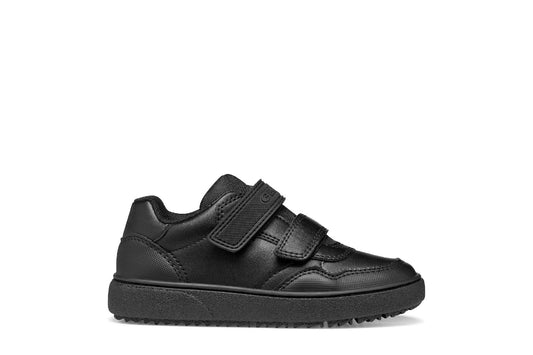 A boys casual school shoe by Geox, style Theleven, in black with double velcro fastening. Right side view.