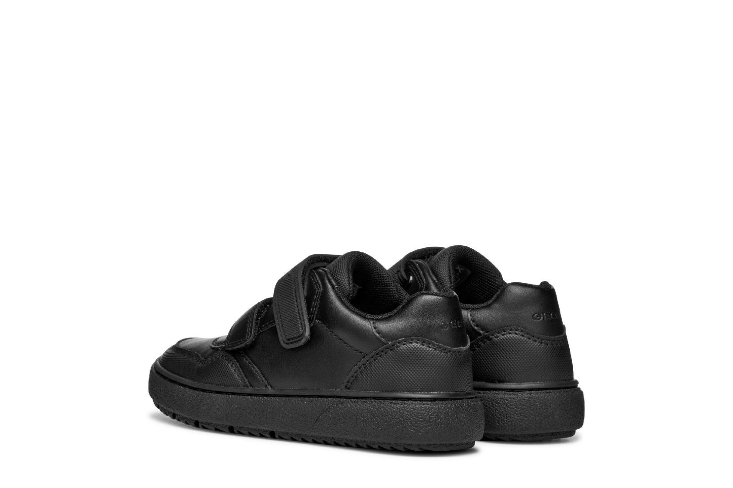 A boys casual school shoe by Geox, style Theleven, in black with double velcro fastening. Left side view of a pair.