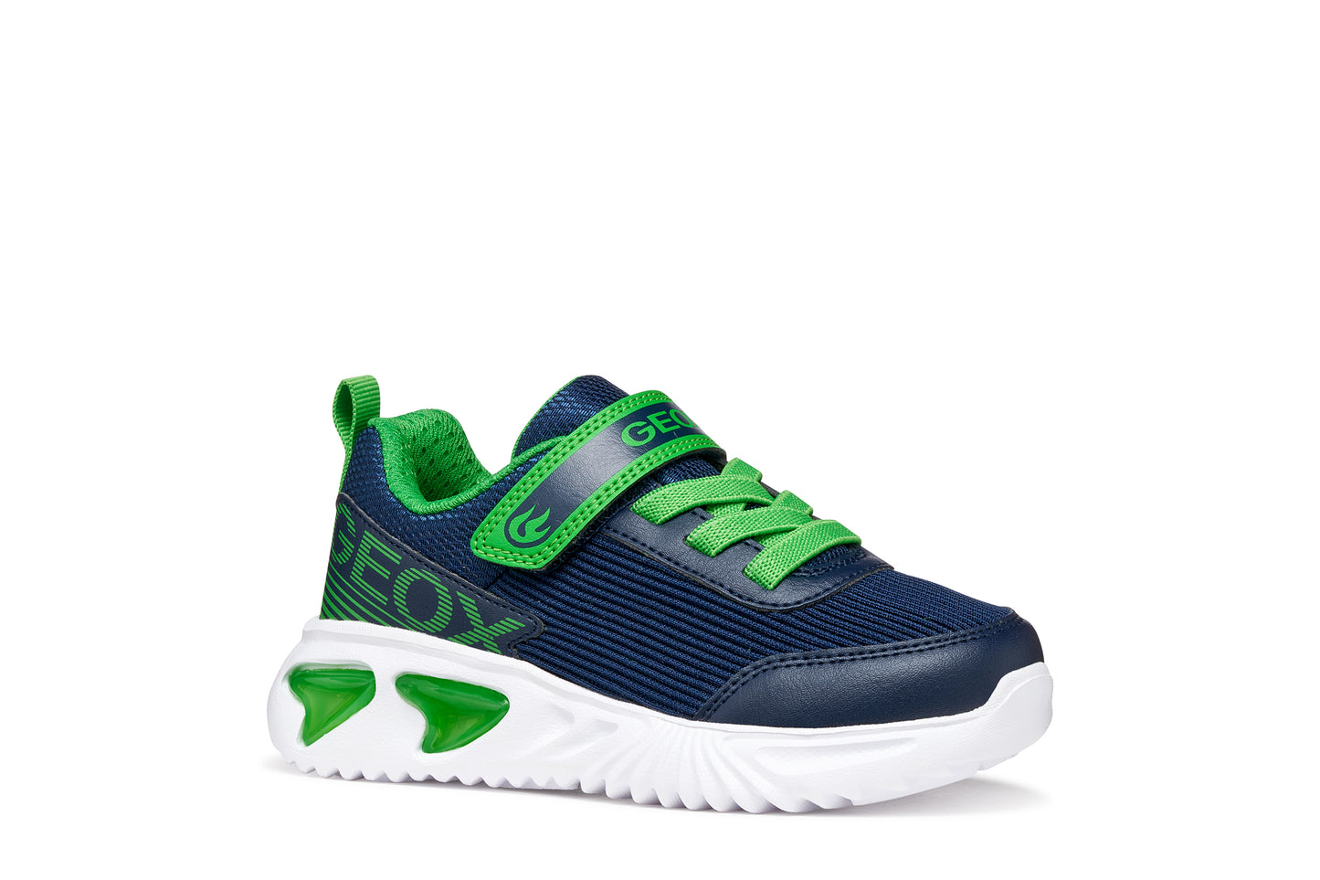 A boys trainer by Geox style Assister in navy/green with velcro strap, elastic laces, large geox logo on the side and lights in white sole. Right side view