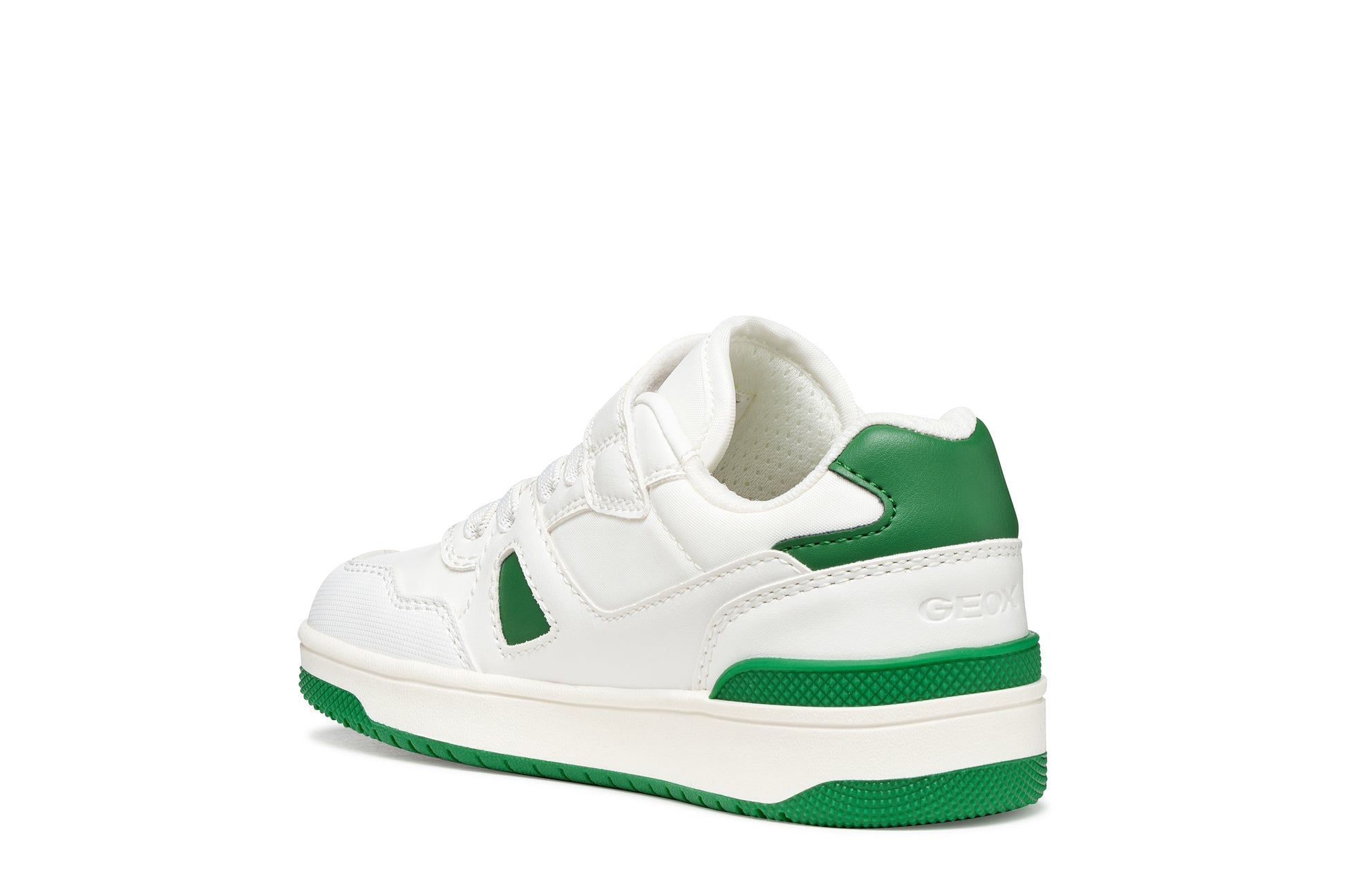 White sneaker with green accents on a white background