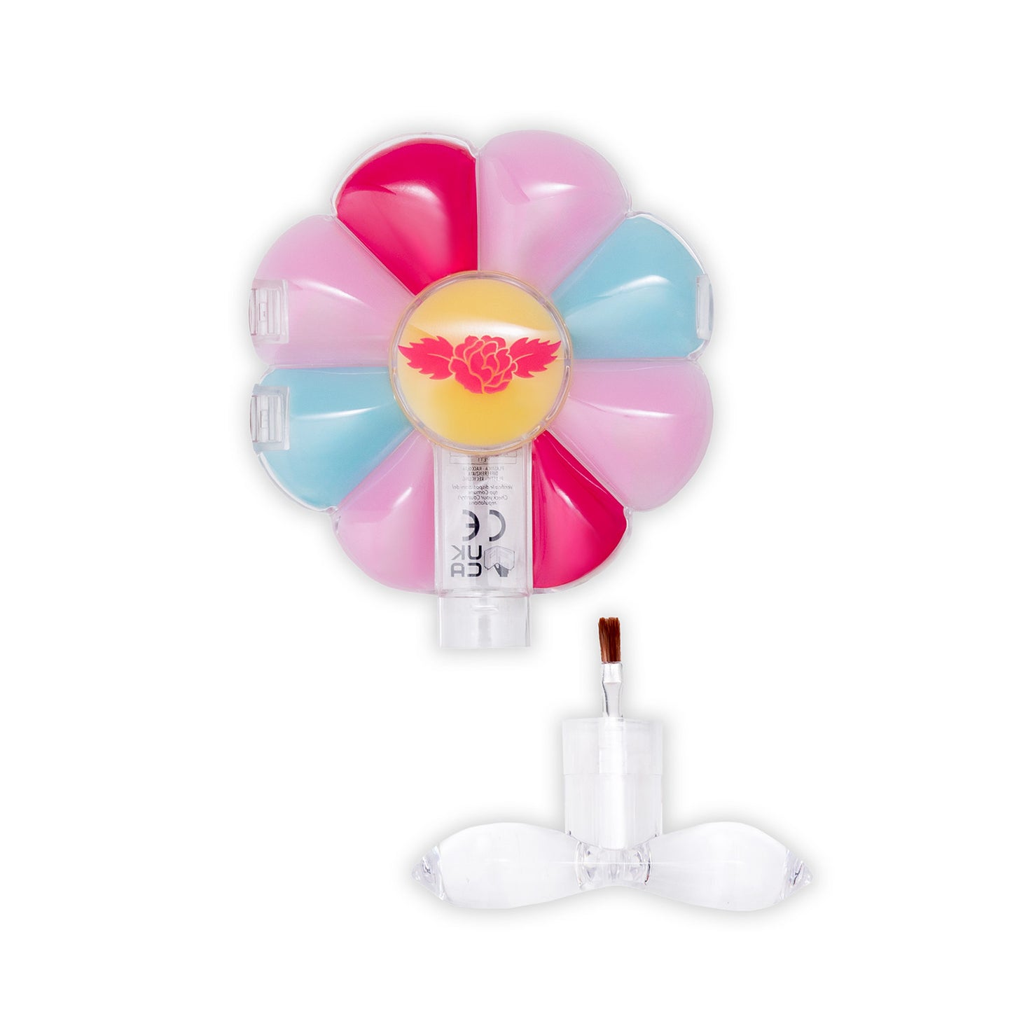 Colourful flower-shaped lip gloss palette with a central circular design on a white background. Clear plastic stem detached with small brush inside.