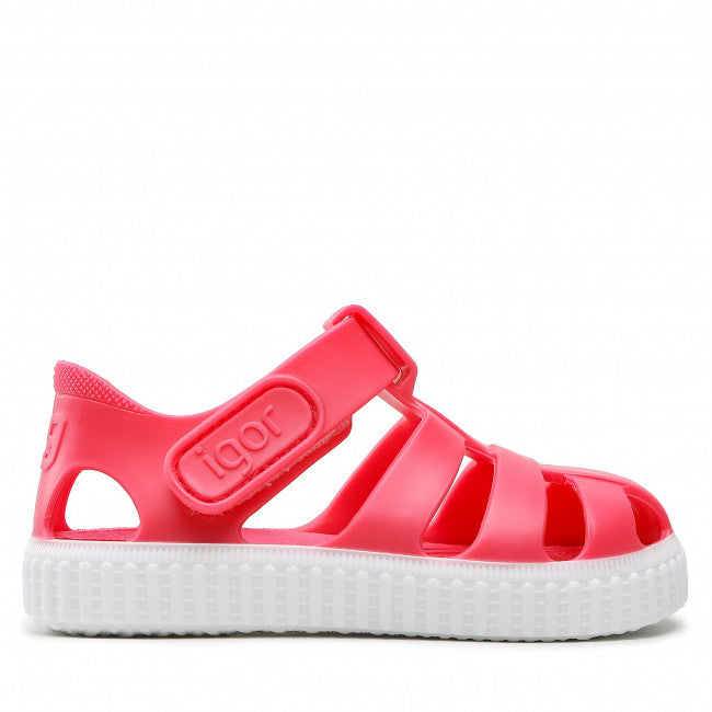 A unisex closed toe jelly shoe by Igor, style Nico, in red and white with velcro fastening. Right side view.