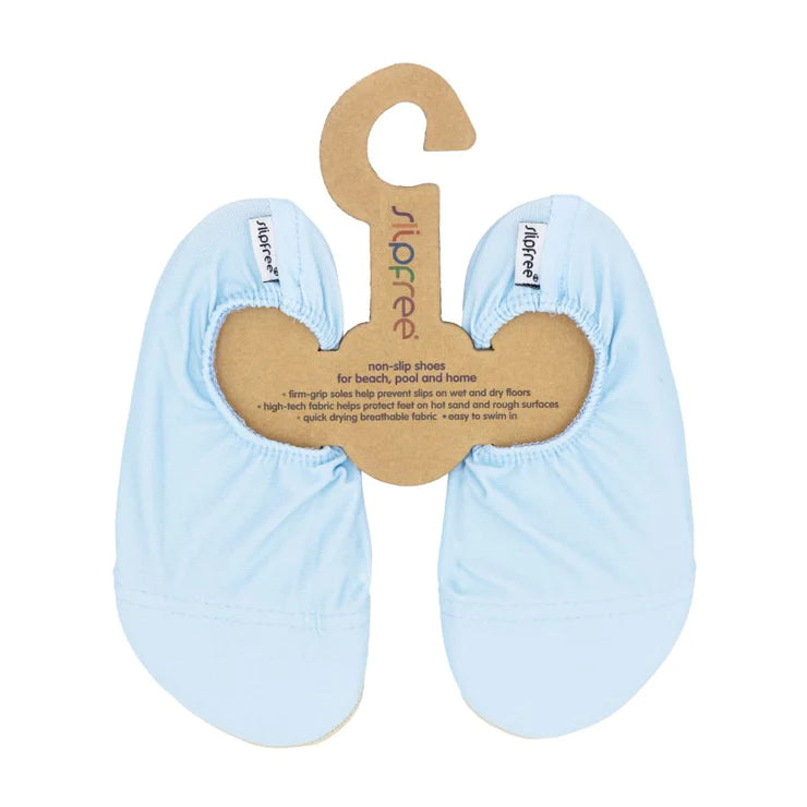 A pair of boys non-slip swim shoes by Slipfree, style Pale Blue, in blue. Front view.