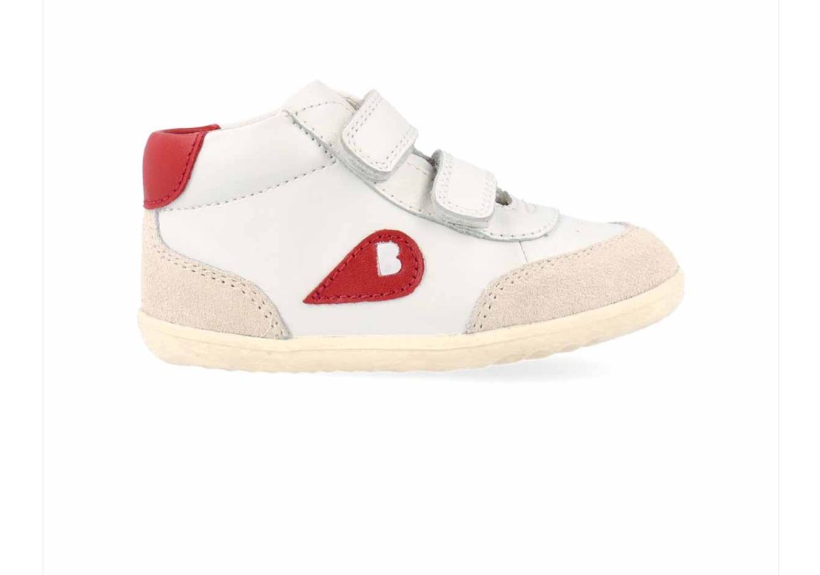 A unisex high top casual boot by Bobux, style Champ, in white with nude and red trim and double velcro fastening. Right side view.