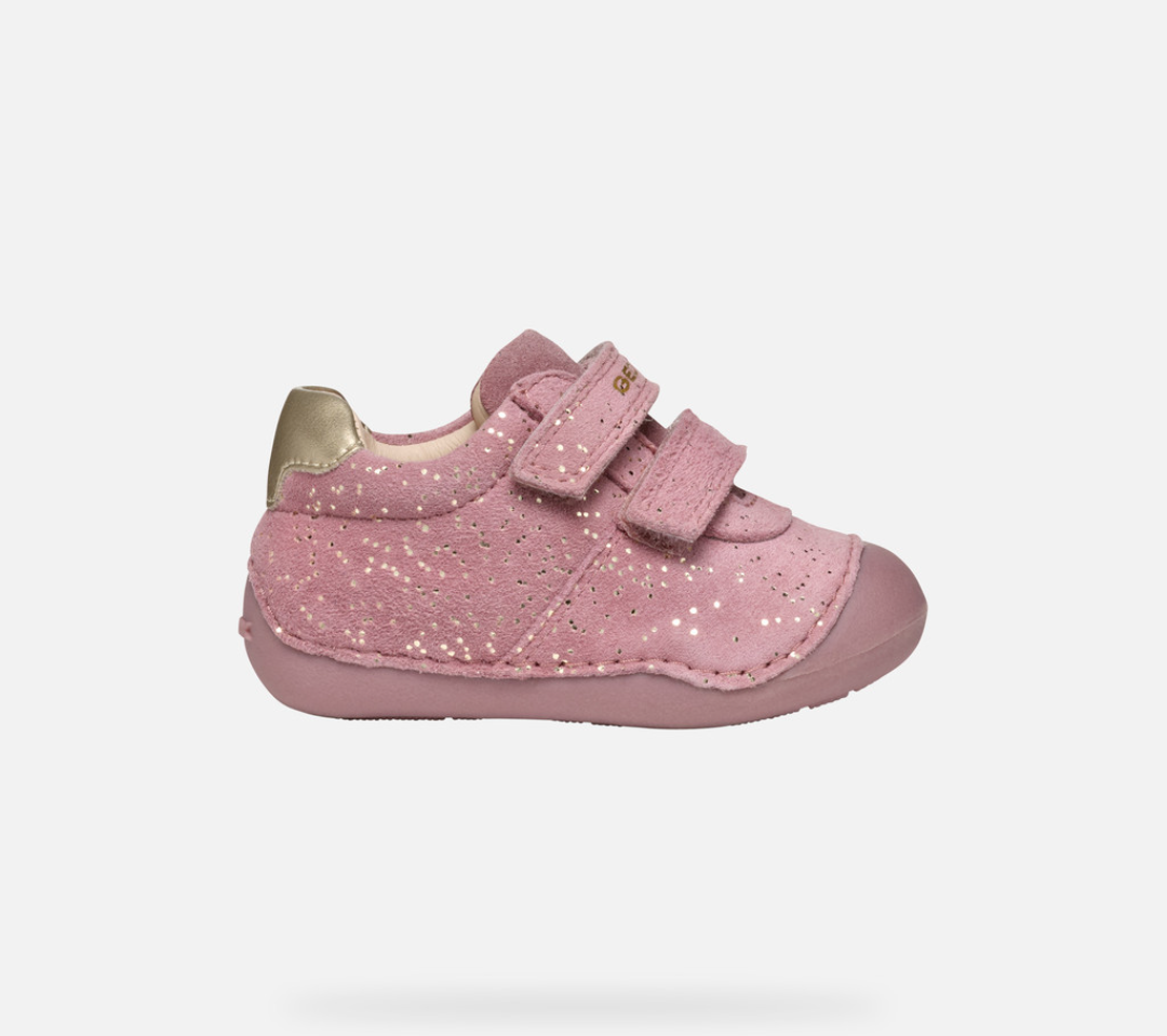 A girls pre walkers by Geox, style B Tutim Girl, in pink nubuck with gold splash print and trim. Double velcro fastening. Right side view.
