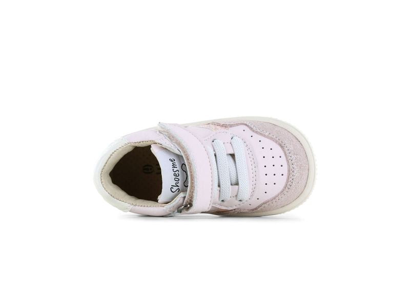 A girls mid top trainer by Shoesme, style BN25S012-C in white and pink, velcro and elastic lace fastening. Above view on it's side.