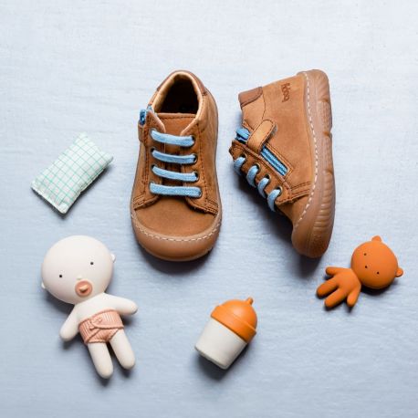 A boys first shoe by Bopy, style Jejoc in tan with lace / zip fastening. Commercial view.