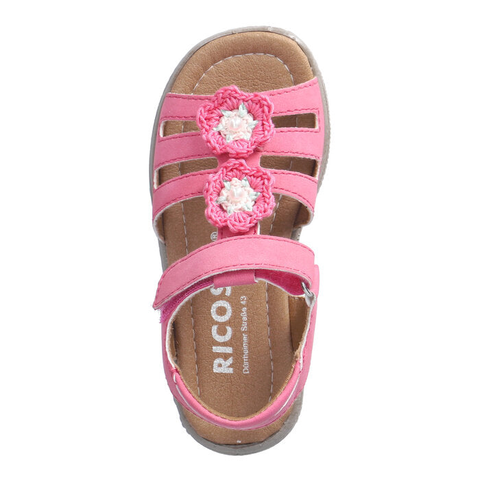 A girls sandal by Ricosta in style Camilla in pink, with crochet flower details and velcro strap. Top view