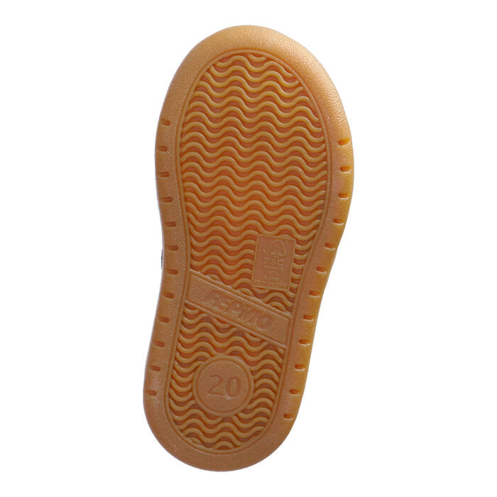 A boys casual shoe by Ricosta, style Dakota in nautic with two velcro straps and white stripe detail on side. View of sole