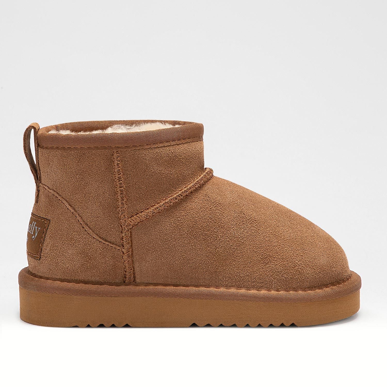 A girls warm lined pull on ankle boot by Lelli Kelly, style LKHK2262 Giulia, in brown suede with cream fur lining. Right side view. 