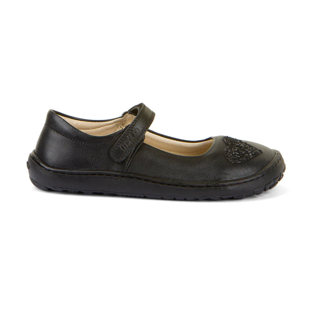 A girls Mary Jane  school shoe by Froddo, style Nina H 3140191, in black leather with glitter heart to front upper and velcro fastening. Right side view.