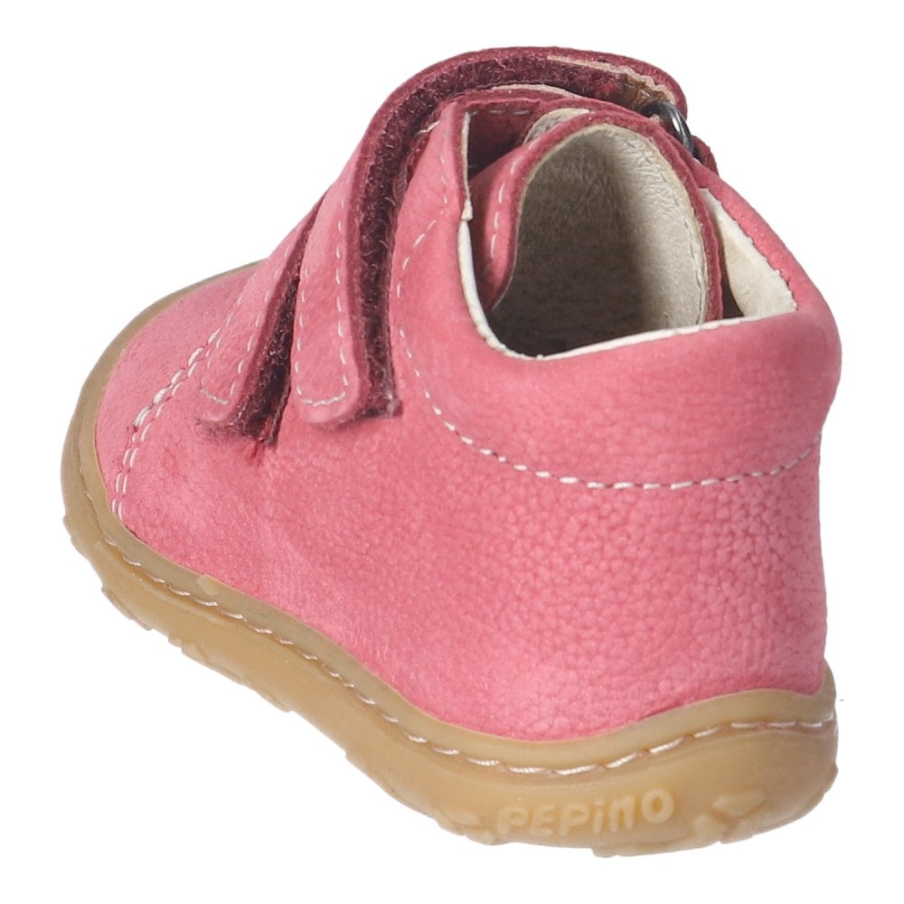 A girls boot by Ricosta, with toe bumper in pink with double velcro fastening. Angled view.