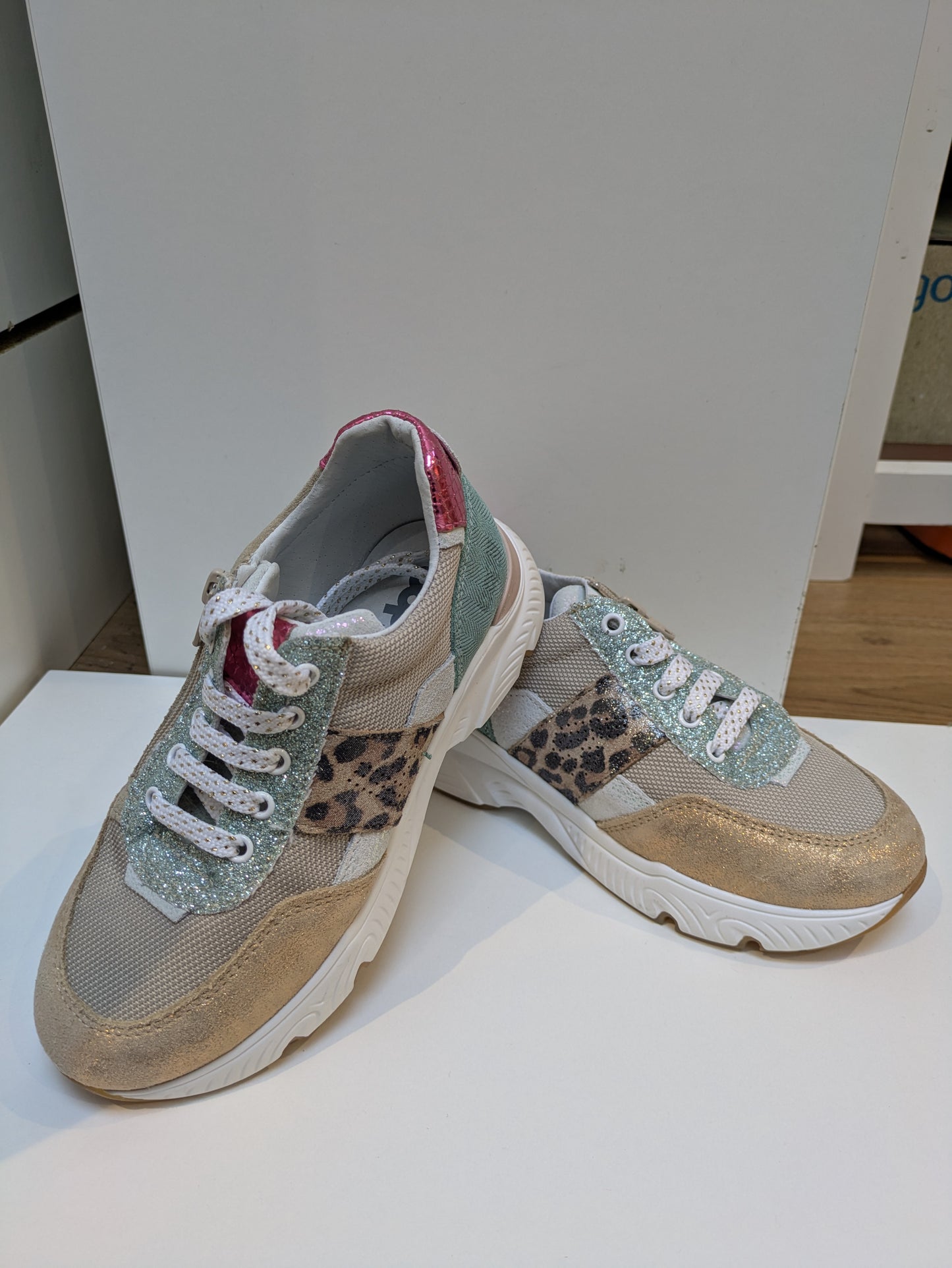 A girls casual trainer by Bopy, style Sarbacane in beige / multi, lace / zip fastening.  Angled picture of a pair.