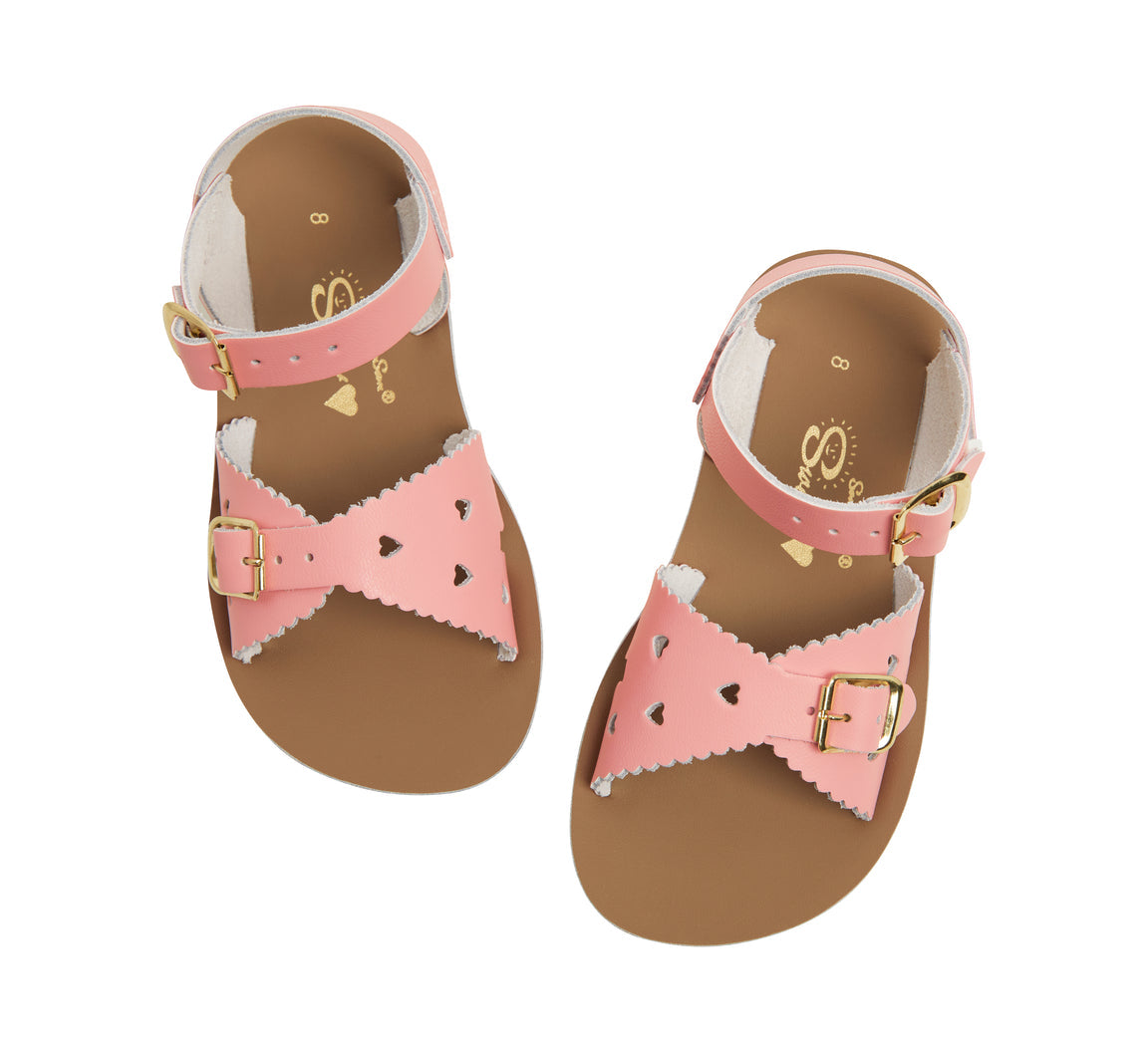 A girls sandal by Salt Water, style Sweetheart in pink, buckle fastening. Top view.