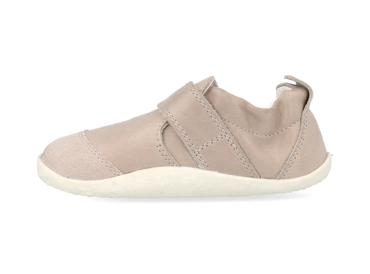 A unisex pre-walker by Bobux, style XP Marvel,in  taupe leather and suede with velcro strap. Left side view.