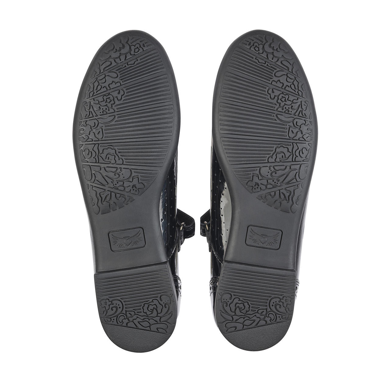 A girls school shoe by StartRite, style Impress in black patent with velcro strap and pattern detail on front and back. View of soles of pair