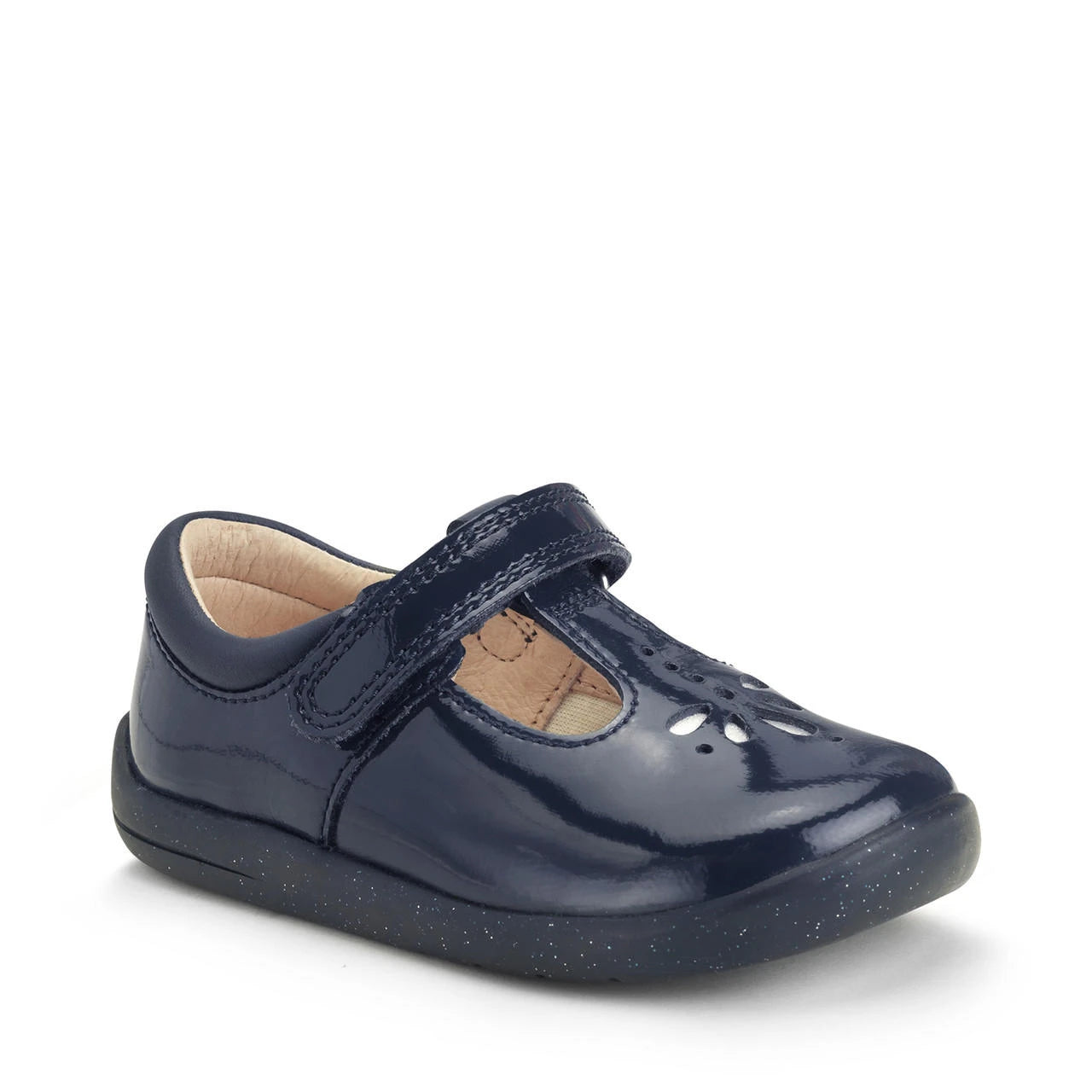 A girls t-bar shoe by StartRite, style Puzzle in patent navy, with flower design on the front and glitter in a black sole. Angled right side view