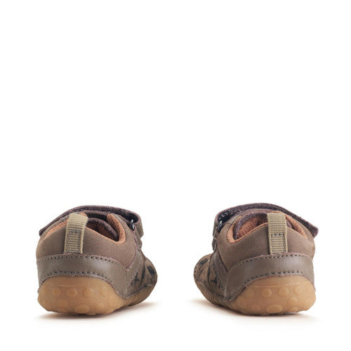 A boys pre walker by Start-Rite, style Roar, in taupe nubuck with dinosaur print and velcro fastening. Heel view.
