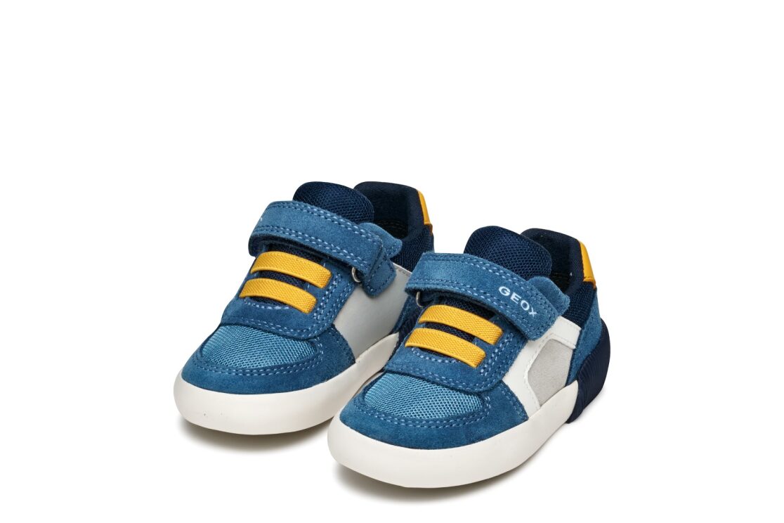 A boys trainer by Geox, style B Gisli, in light blue and yellow with velcro  and yellow elastic lace fastening.  Angled left side view of pair.
