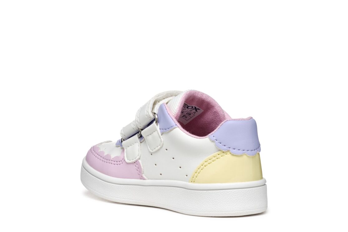 A girls casual shoe by Geox, style B Eclyper in white/ light yellow with double velcro straps. Right rear inner side view.