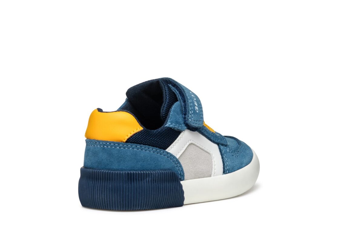 A boys trainer by Geox,style B Gisli, in light blue and yellow with velcro  and yellow elastic lace fastening. Angled right side view.