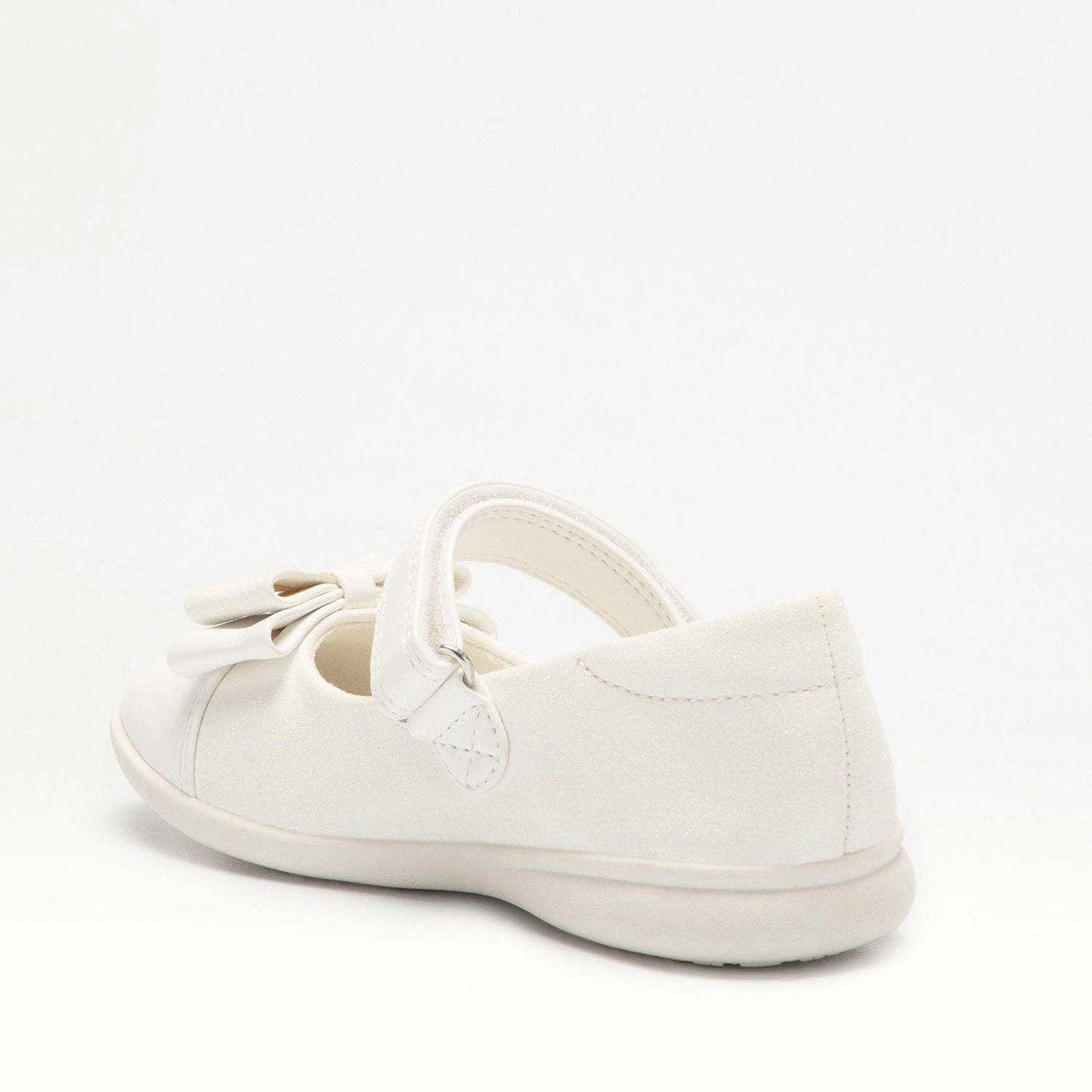 A girls Mary Jane shoe by Lelli Kelly, style LKBA1710 Adele, in white glitter leather with bow detail and velcro fastening. Angled view of left side.