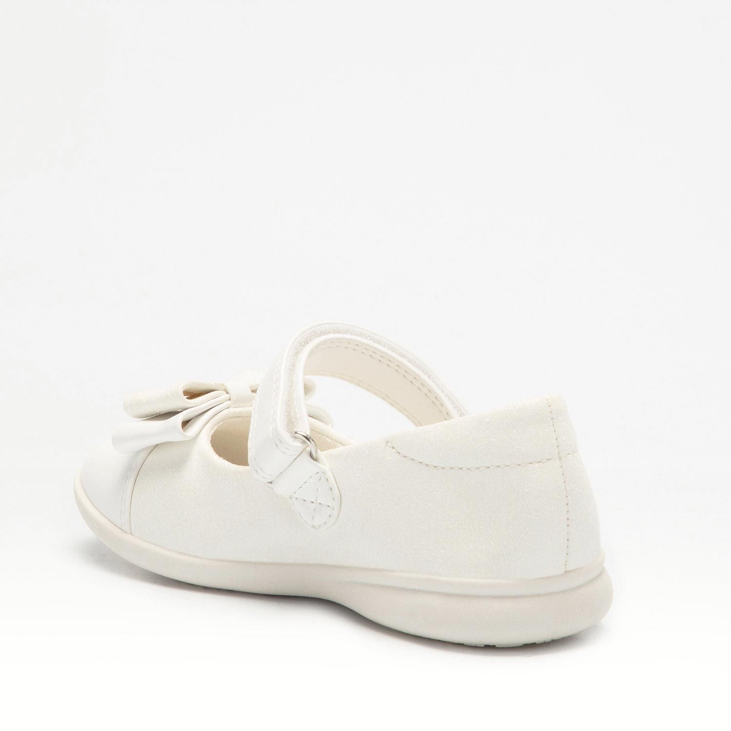 A girls Mary Jane shoe by Lelli Kelly, style LKBA1710 Adele, in white glitter leather with bow detail and velcro fastening. Angled view of left side.