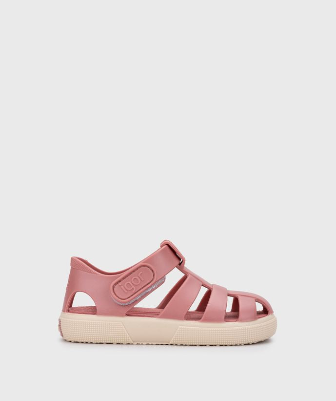 A girl's closed toe jelly sandal by Igor, style Bay, in pink with cream sole with velcro fastening. Right side view.