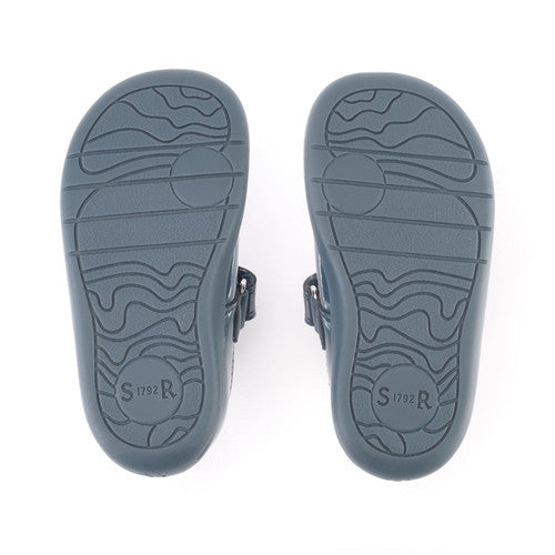 A pair of girls Mary Jane shoes by Start Rite, style Fairy Tale, in pale blue patent with velcro fastening. Sole view.