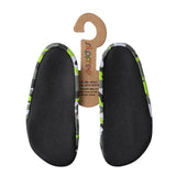 A boys non slip shoe by Slipfree, style Oscar in camouflage print. Sole view.