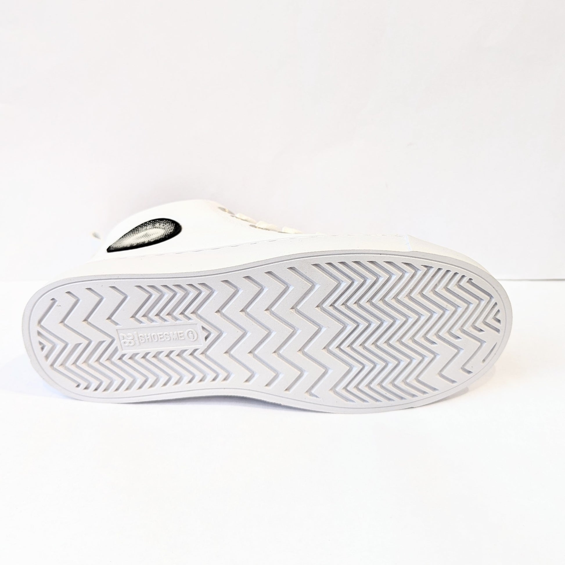 A unisex hi-top by Shoesme, Style SH21S008-F, in white with logo detail, lace/zip up. View of the sole.