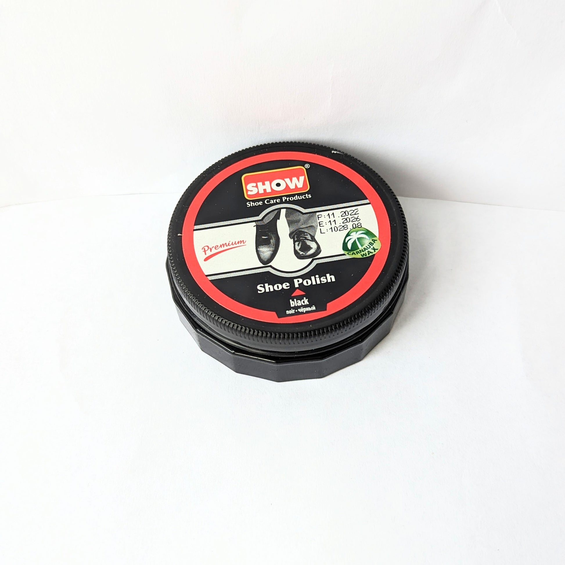 Image of a tin of SHOW Black shoe polish.