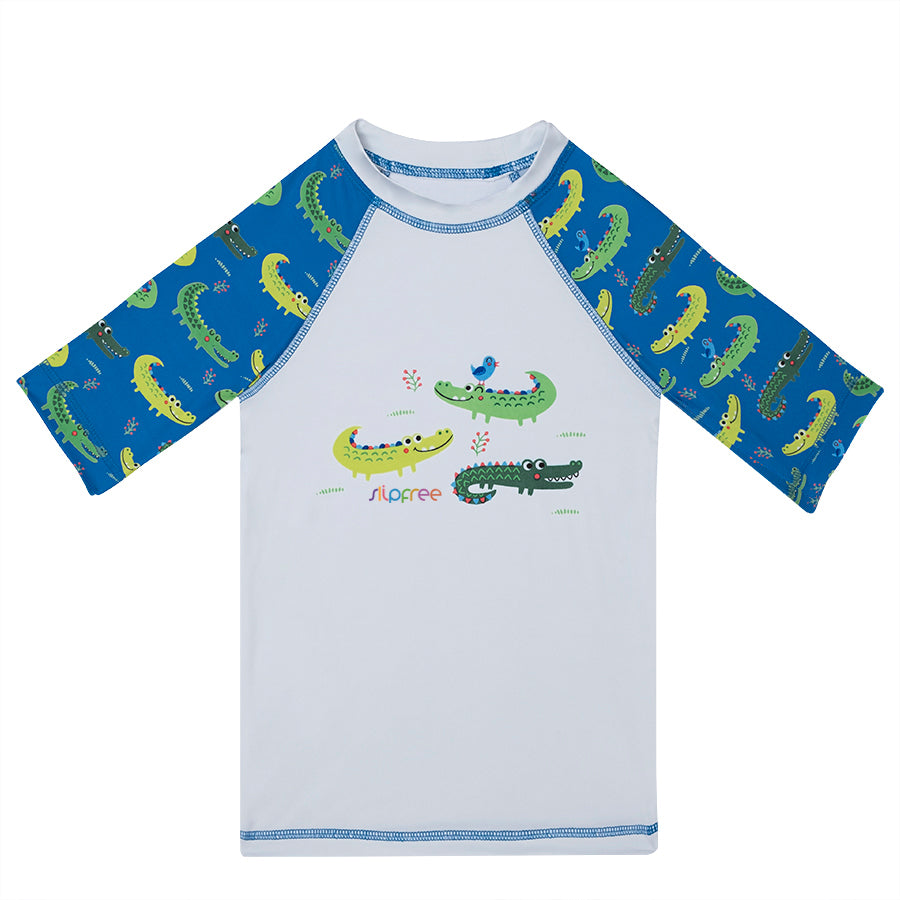 A boys rash vest by Slipfree, style Alligator, in Alligator print. Front view.